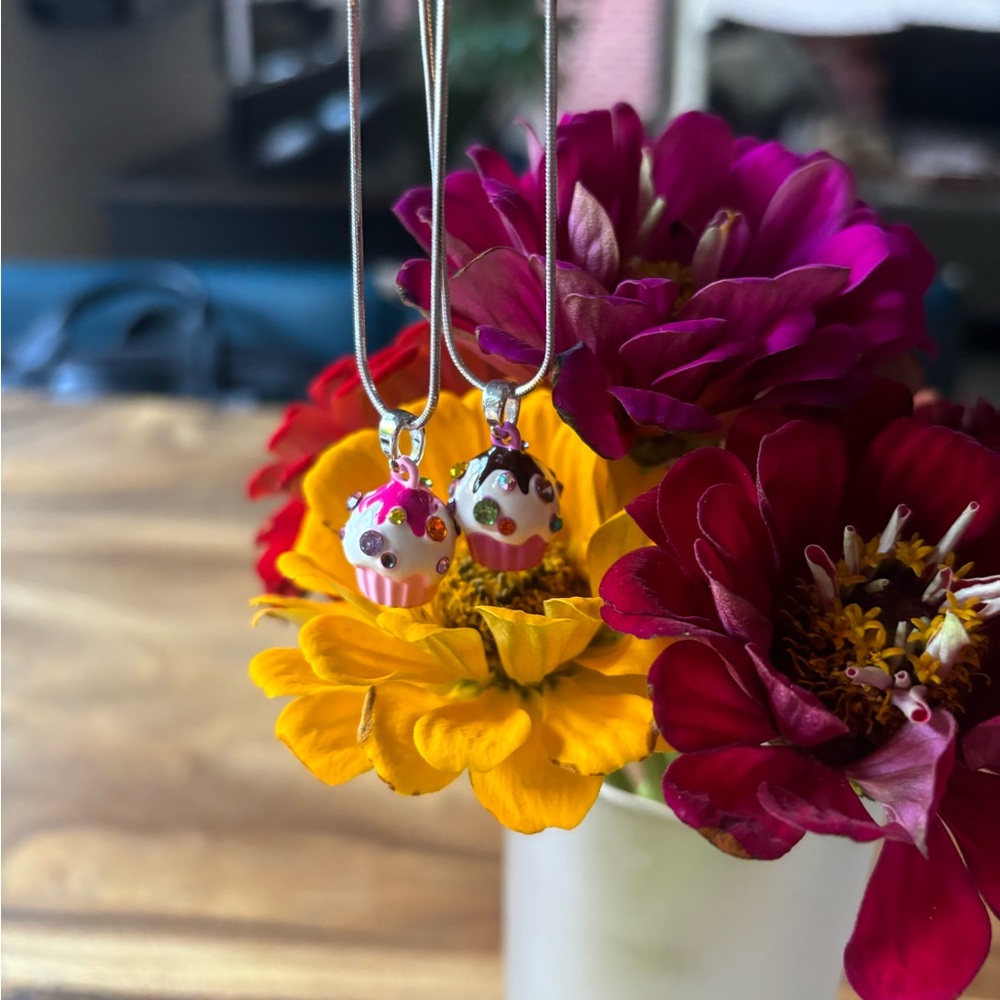 2 cupcake necklaces, brand new.